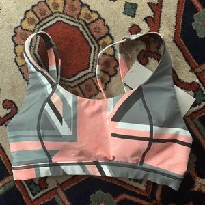 Sweaty Betty workout bra. Peach/grey,size small unique strapping. Very well made